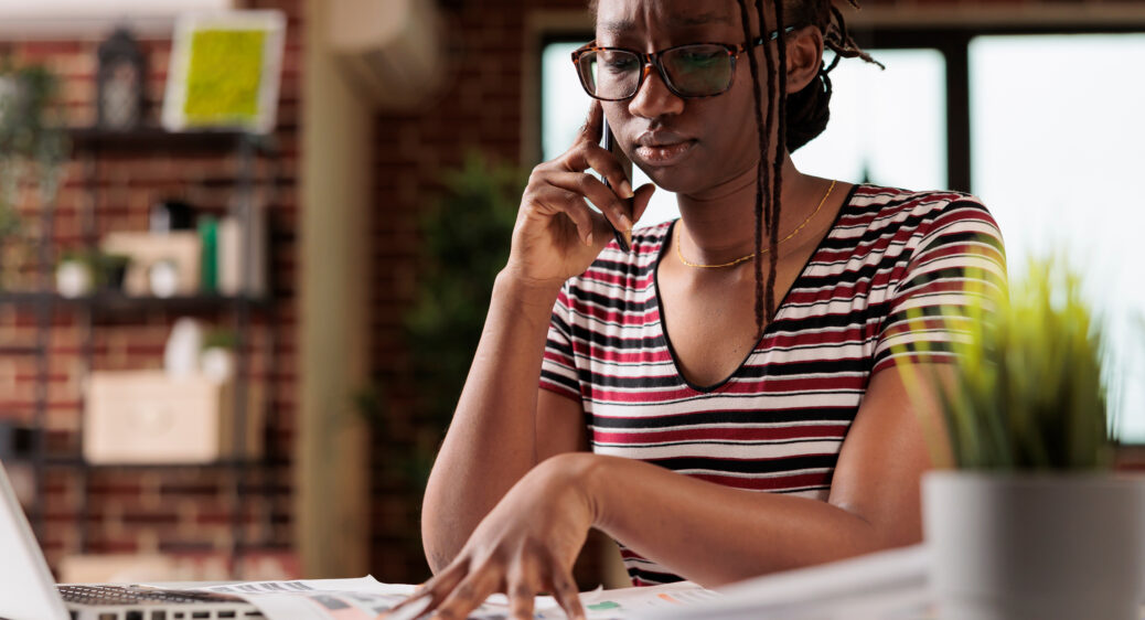 Woman on the phone looking concerned