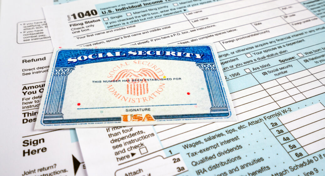 Blank social security card, and 1040 us individual tax income re