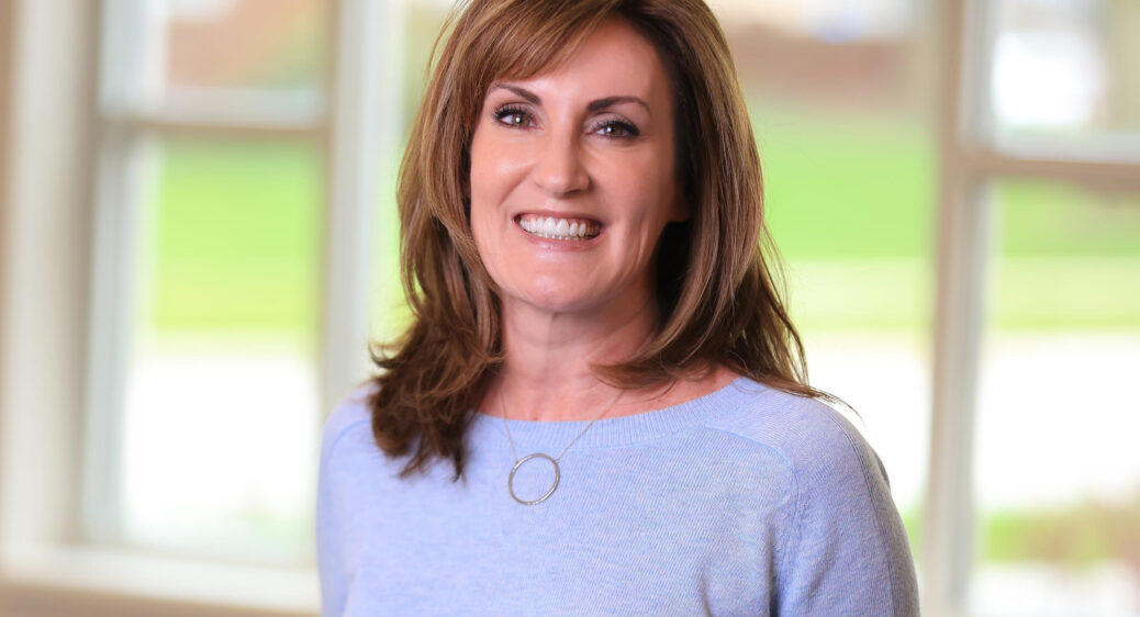 Headshot of Summit DD Senior Manager of Communications, Tricia Perduk